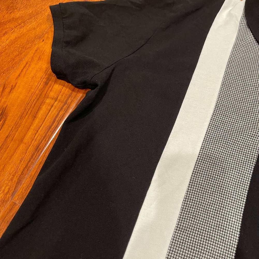Stylish Black Polo Shirt with White Accents - Picture 3 of 10